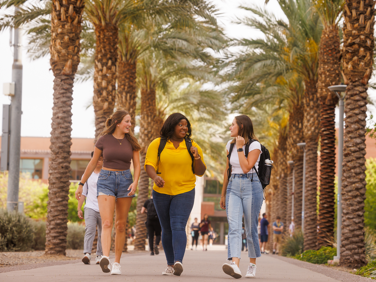 Students at ASU walking around campus