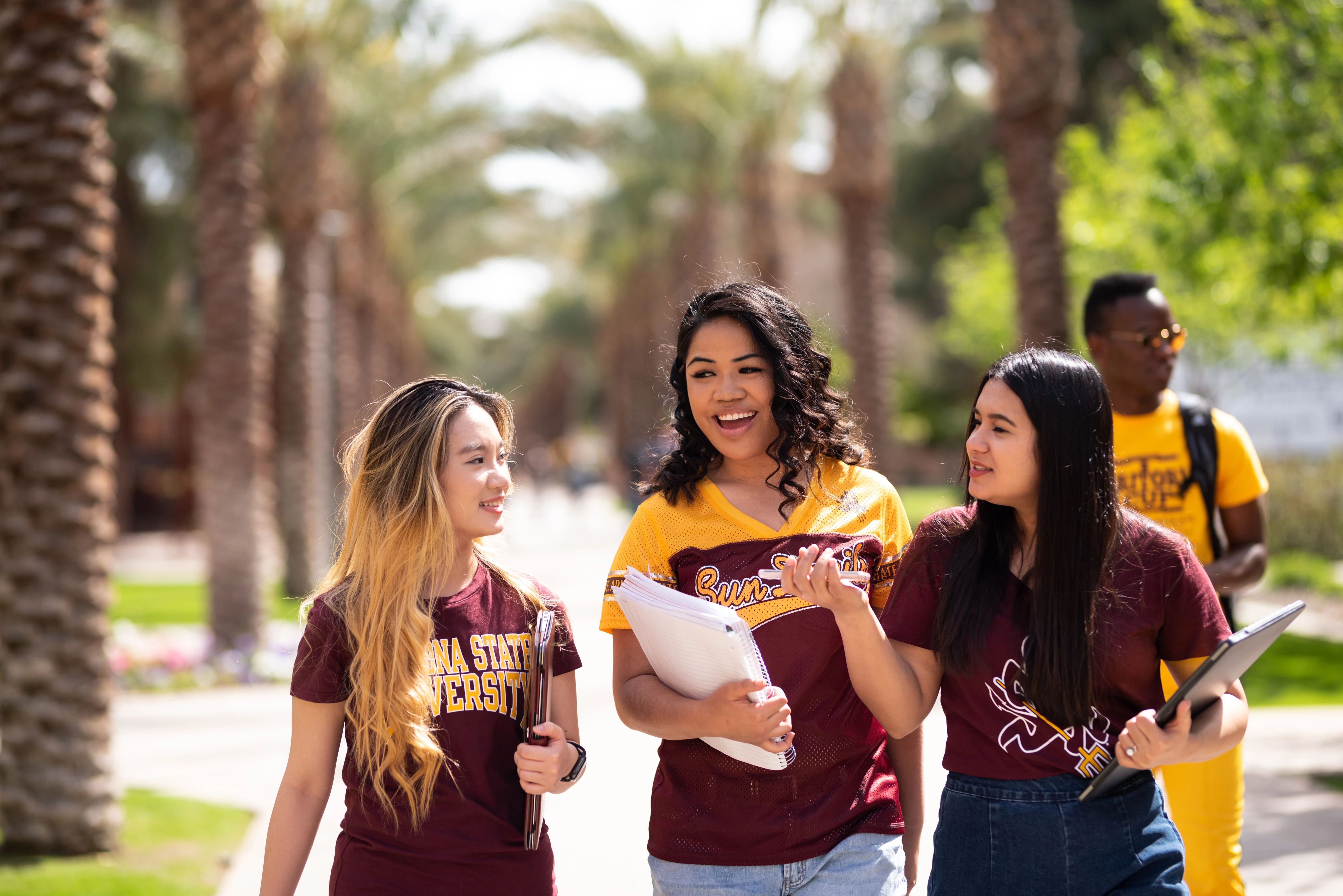 Students at ASU walking around campus